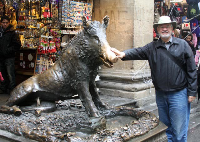 Alan rubbing the snout of Il Porcellino, Florence.