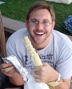 Nick enjoying his roasted corn