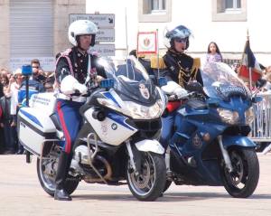 Monégasque Carabiniers on white bike and French Gendarmerie on blue bike