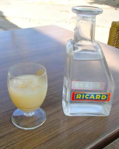 Pastis after dilution with water and 'louching' starting