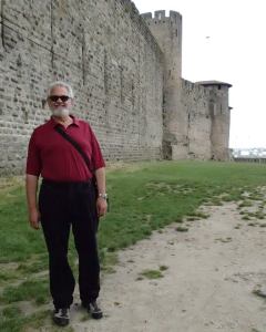Alan hiking the bailey in la Cité de Carcassonne