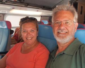 Tracy and Alan traveling by rail