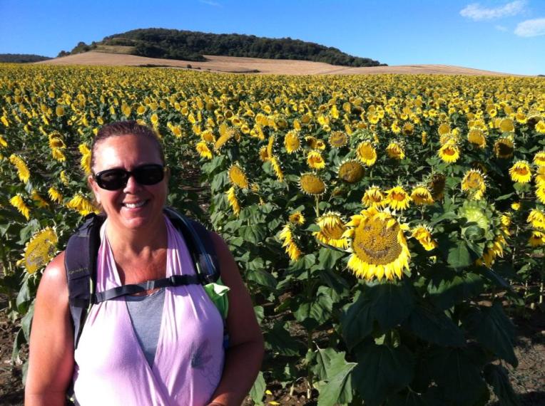 Tracy with the happy sunflowers near Tosantos
