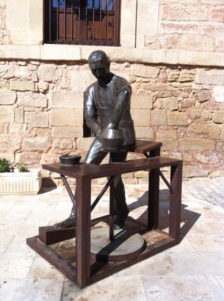 Bronze sculpture of ceramic artisan in Navarette