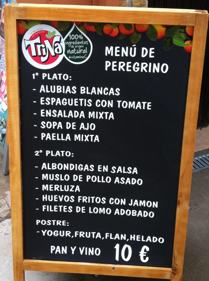 A typical three-course pilgrim’s menu – primo (appetizer), secondo (primary plate) and postre (dessert) and includes bottle of wine