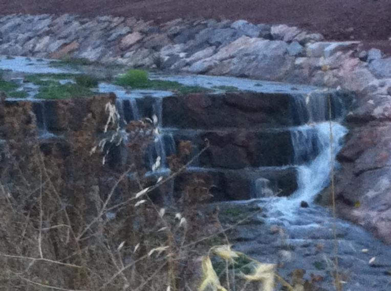 Small waterfall in canal near Ciruena