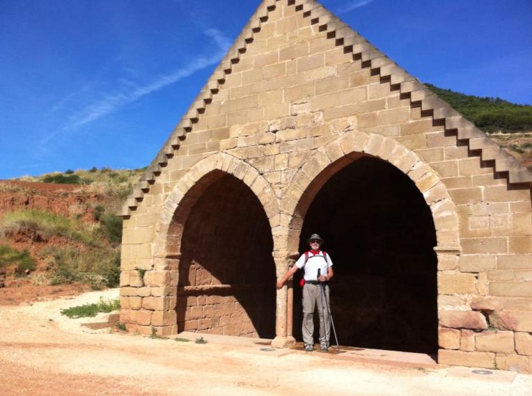 Alan at the double-arched entry of Fuente de Los Moros, 13th century