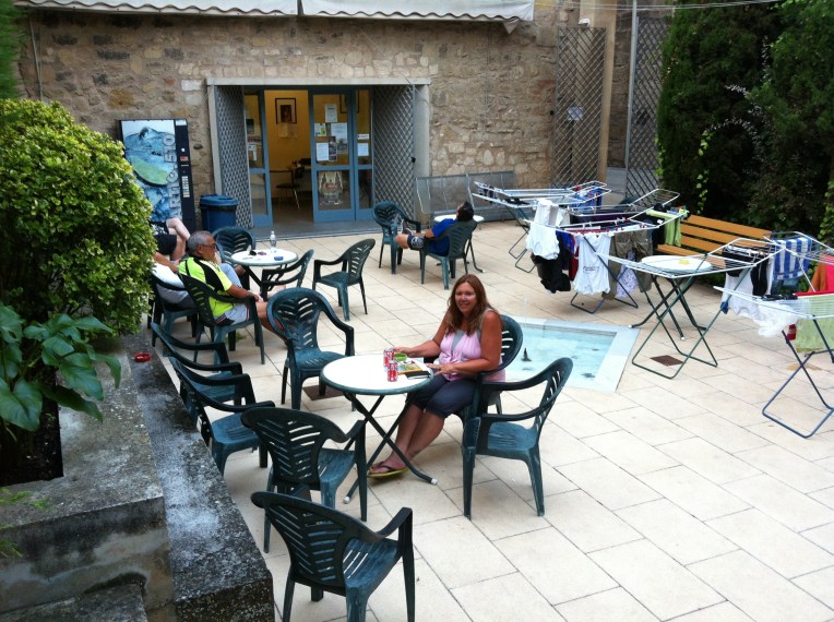 Tracy enjoying the patio at the albergue in Logrono