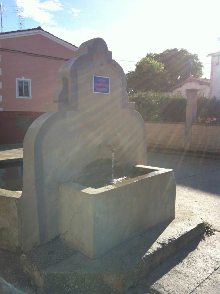 Pilgrim’s fountain in Villambistia, the pool on the opposite side was filled with koi