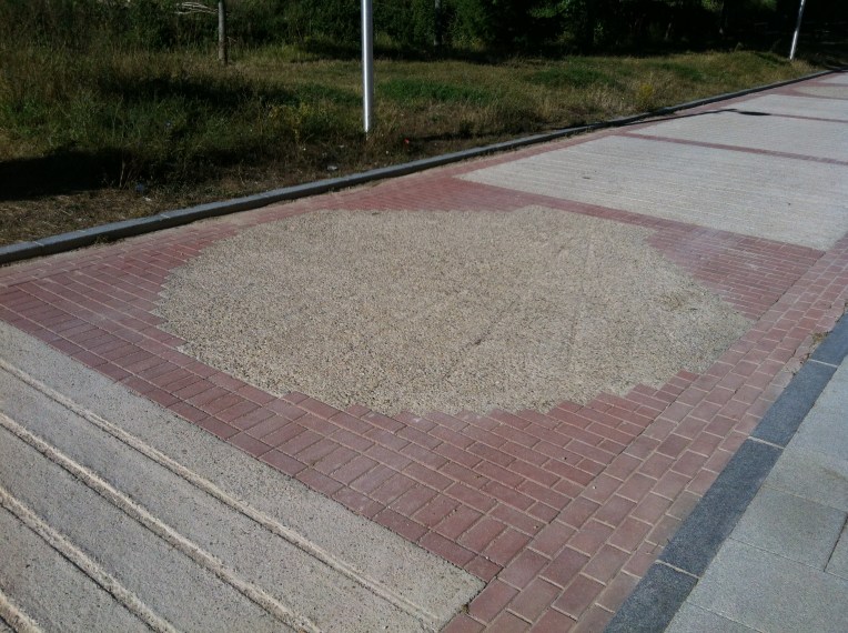 Clever scallop shell design imbedded into walkways in San Juan de Ortega