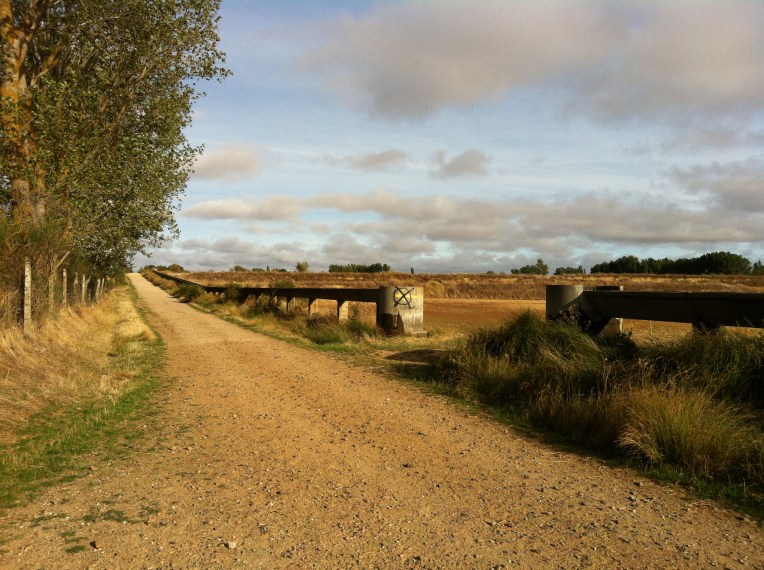 Farmland trail with raised aqueduct
