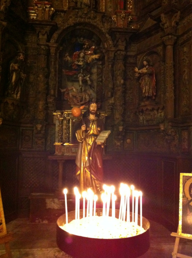 Lighting a candle for Kiara, Santa María del Camino, 12th century façade