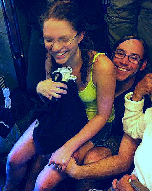Megan and Casey sitting on the train floor.