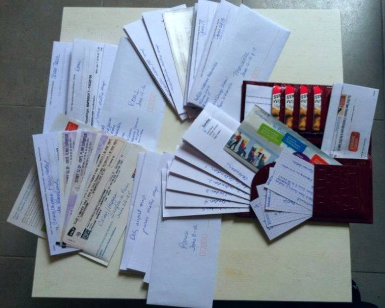 Tracy's collection of tickets, passes, reservations, and confirmations.