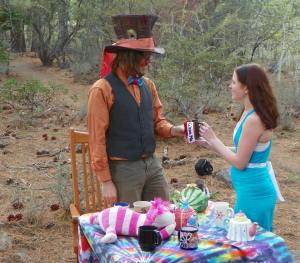 Casey "The Mad Hatter" proposes to Megan "Alice"